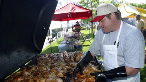 Manning the pit during the International Bar-B-Q Festival in Owensboro, Kentucky