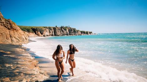Strolling the black-sand beach on Vieques