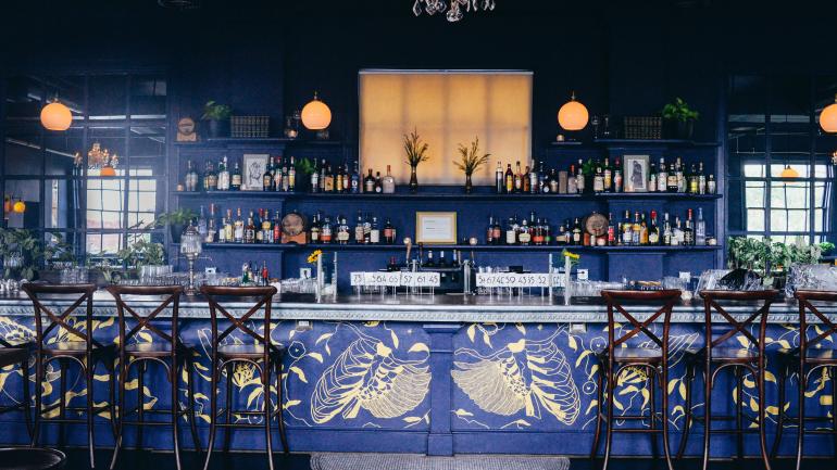 A colorful place for a beverage at the Bluebird Cocktail Room in Hampden