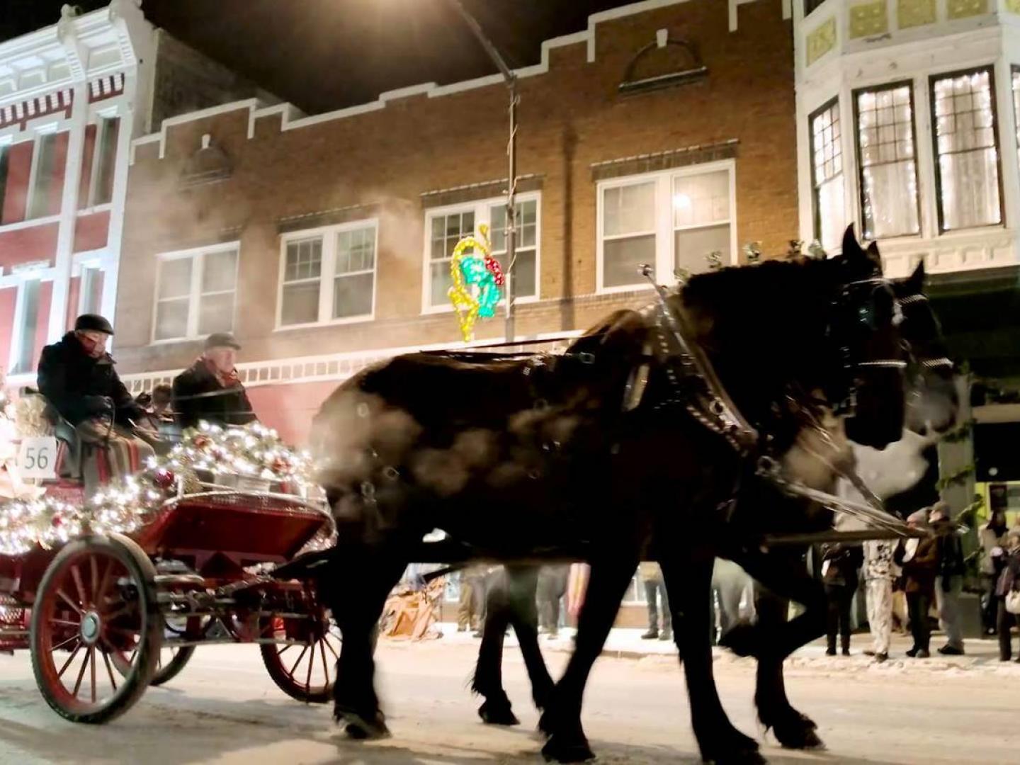 Pulling the Christmas Parade wagon through the streets