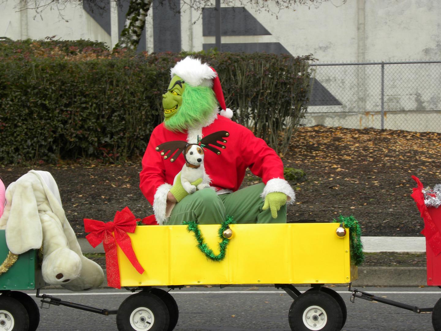Festive costumes for humans and pets at the Springfield Christmas Parade