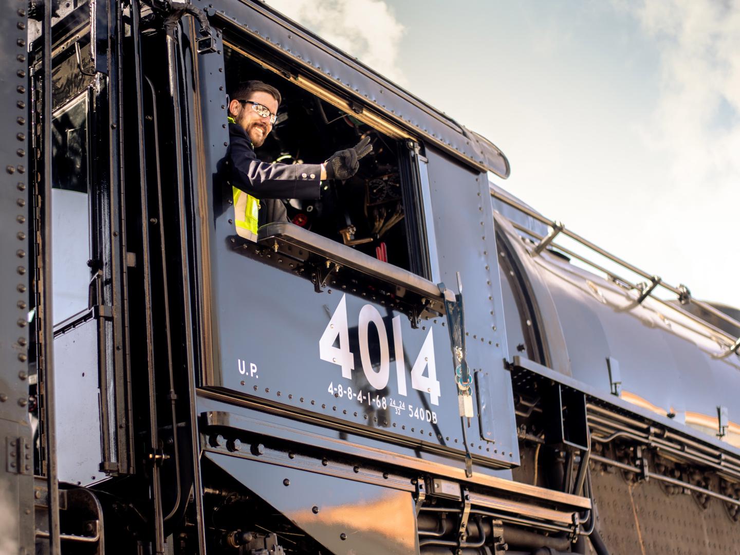 Waving from the Big Boy train engine during Depot Days at Union Pacific Depot in Cheyenne, Wyoming