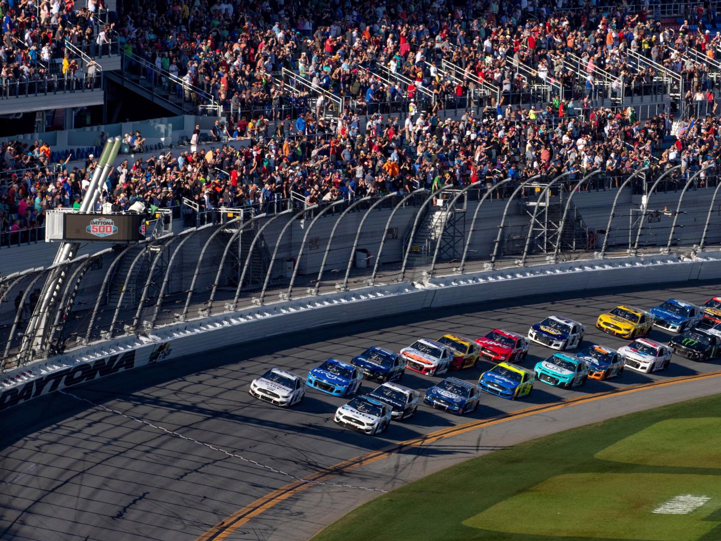 Fans cheer at the Daytona 500 at the Daytona International Speedway in Daytona Beach, Florida