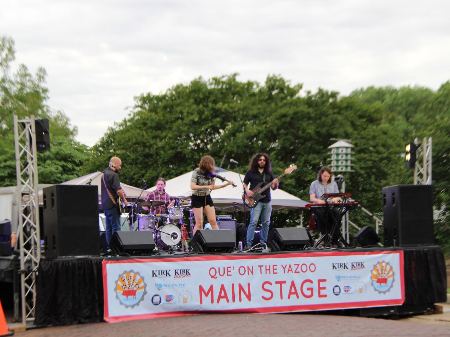 A band plays the main stage of the Que’ on the Yazoo event in Greenwood, Mississippi