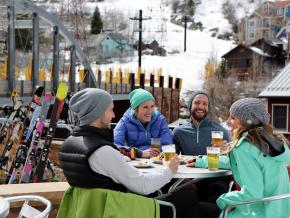 Relaxing at Town Lift Plaza after ski runs on the mountain