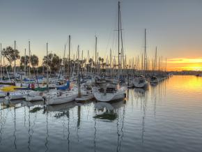 A peaceful marina scene at dusk