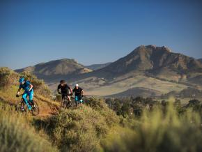 Mountain biking on trails through the hills