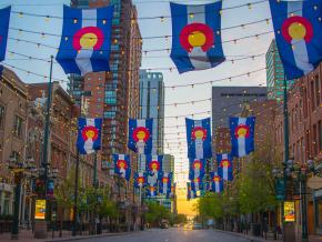 Colorado state flags flying over Larimer Square in Denver Colorado state flags flying over Larimer Square in Denver