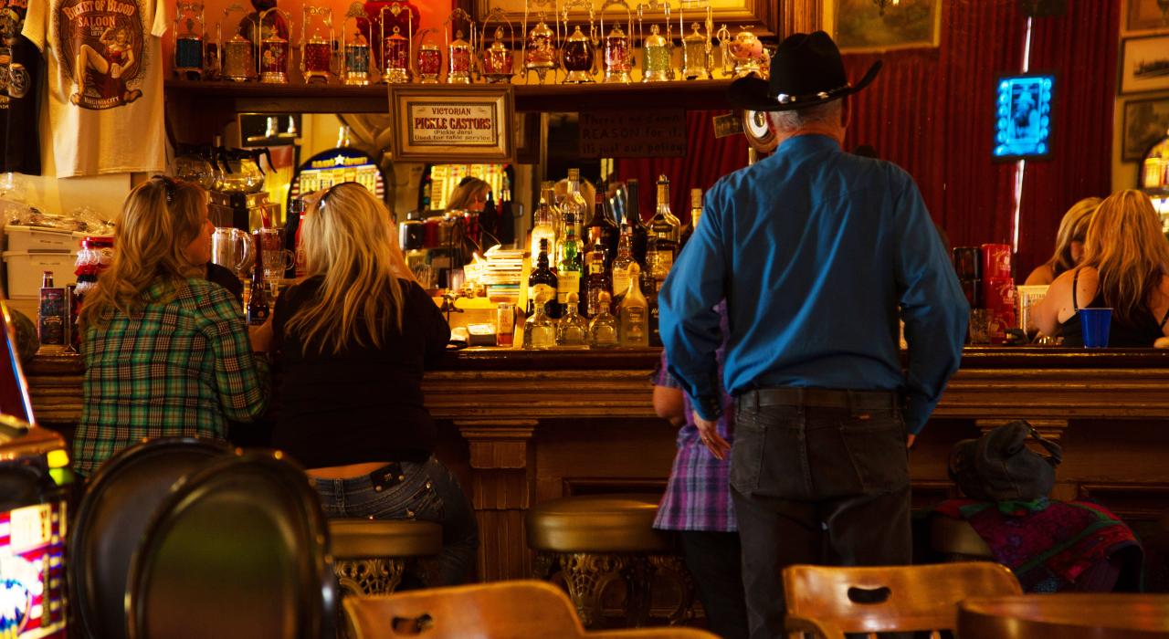 Patrons ordering a drink at Red Dog Saloon in Virginia City, Nevada