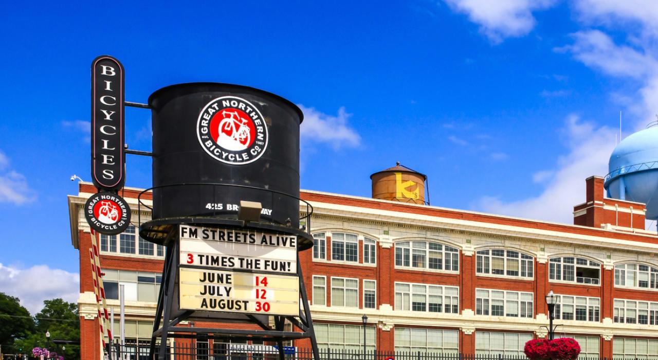 Old railway water tower in front of the Fargo-Moorhead complex
