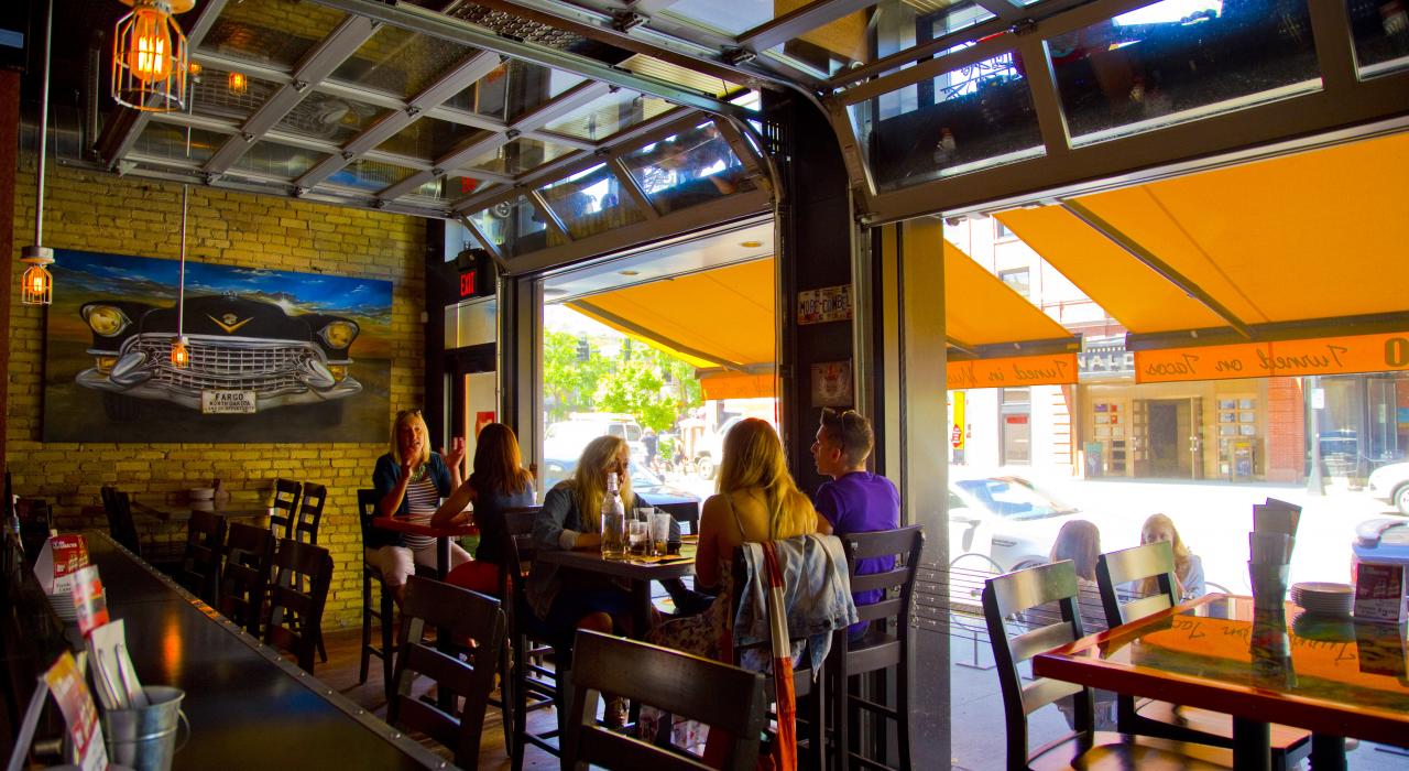 Enjoying a meal in the hip atmosphere at Vinyl Taco