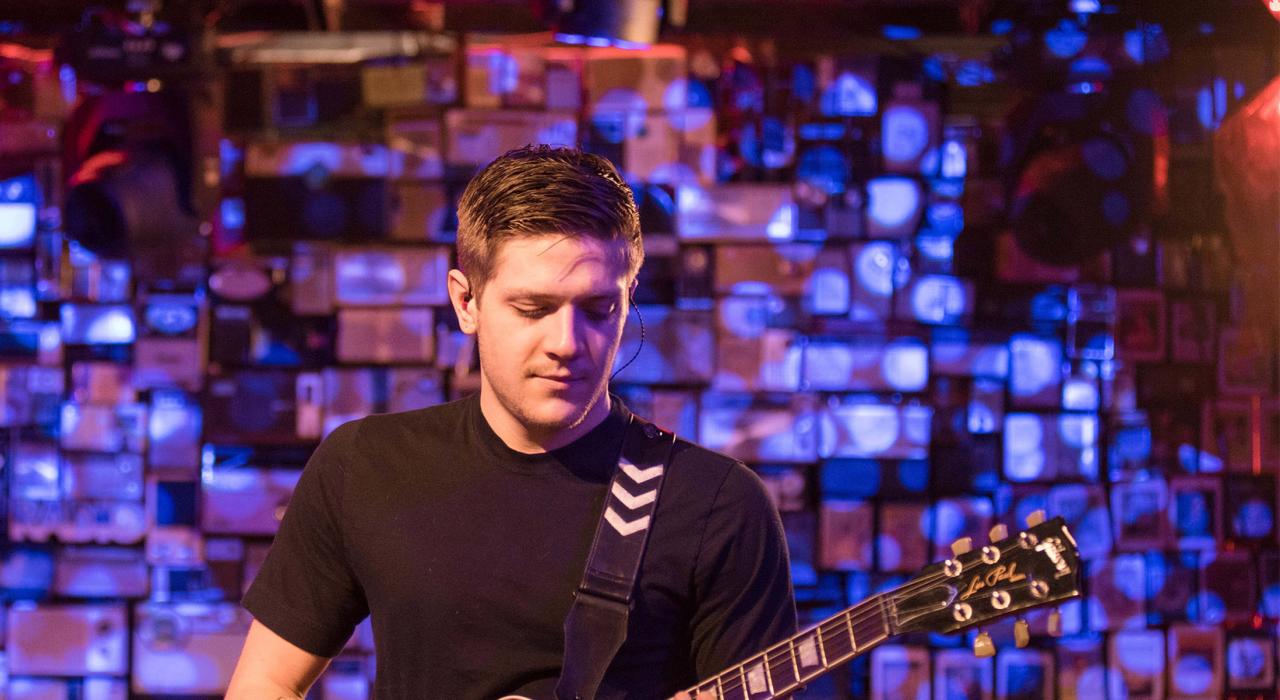 Bass Physics plays guitar in Denver, Colorado