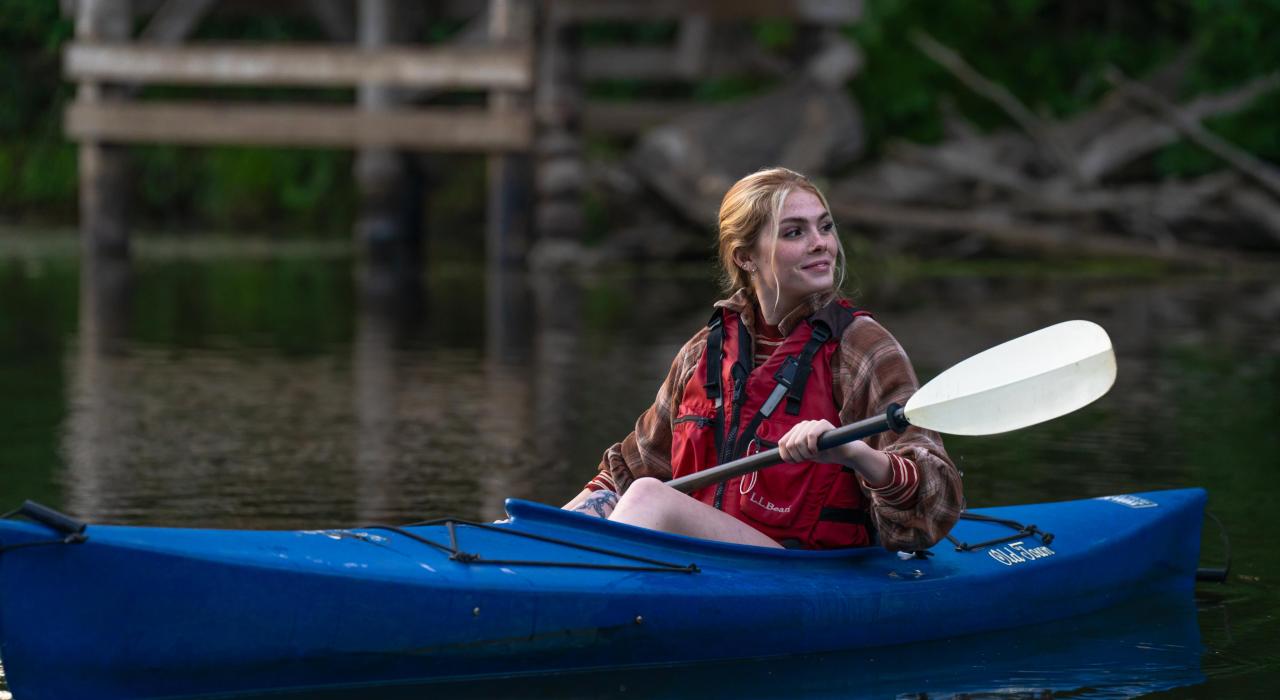 A kayaker enjoys a peaceful day on the water