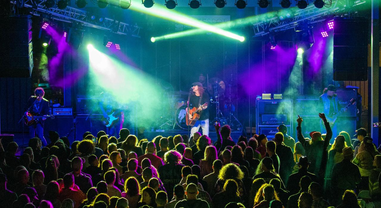 Enjoying a concert on the lawn at open-air entertainment complex Haute Spot