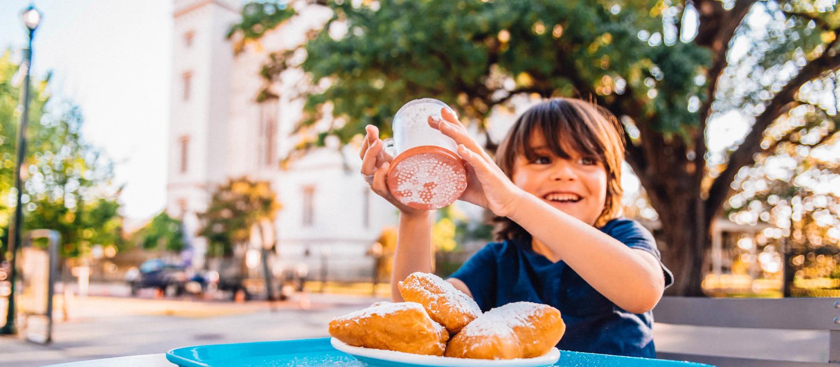 Getting ready to enjoy some beignets, a favorite New Orleans, Louisiana, pastry